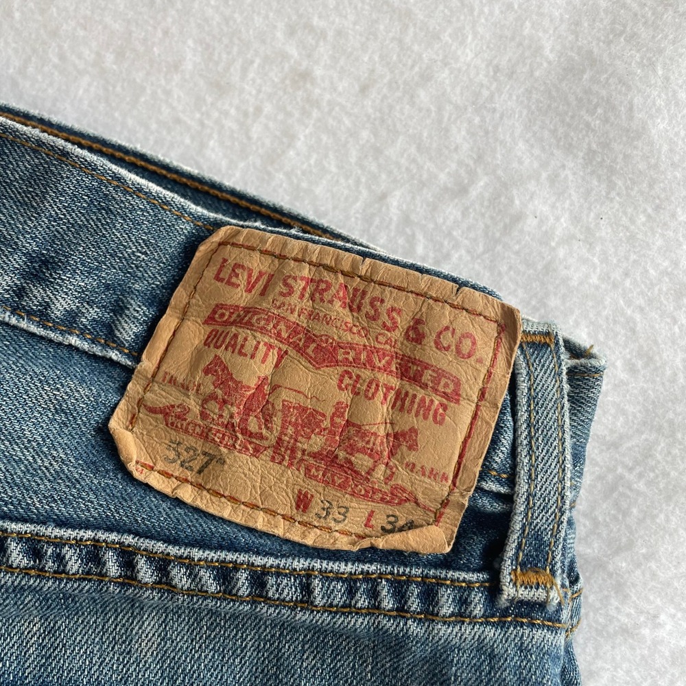 Levi's 527 Low Rise Bootcut Jeans Mens 33x34 Blue Denim Frayed Hem Medium Wash